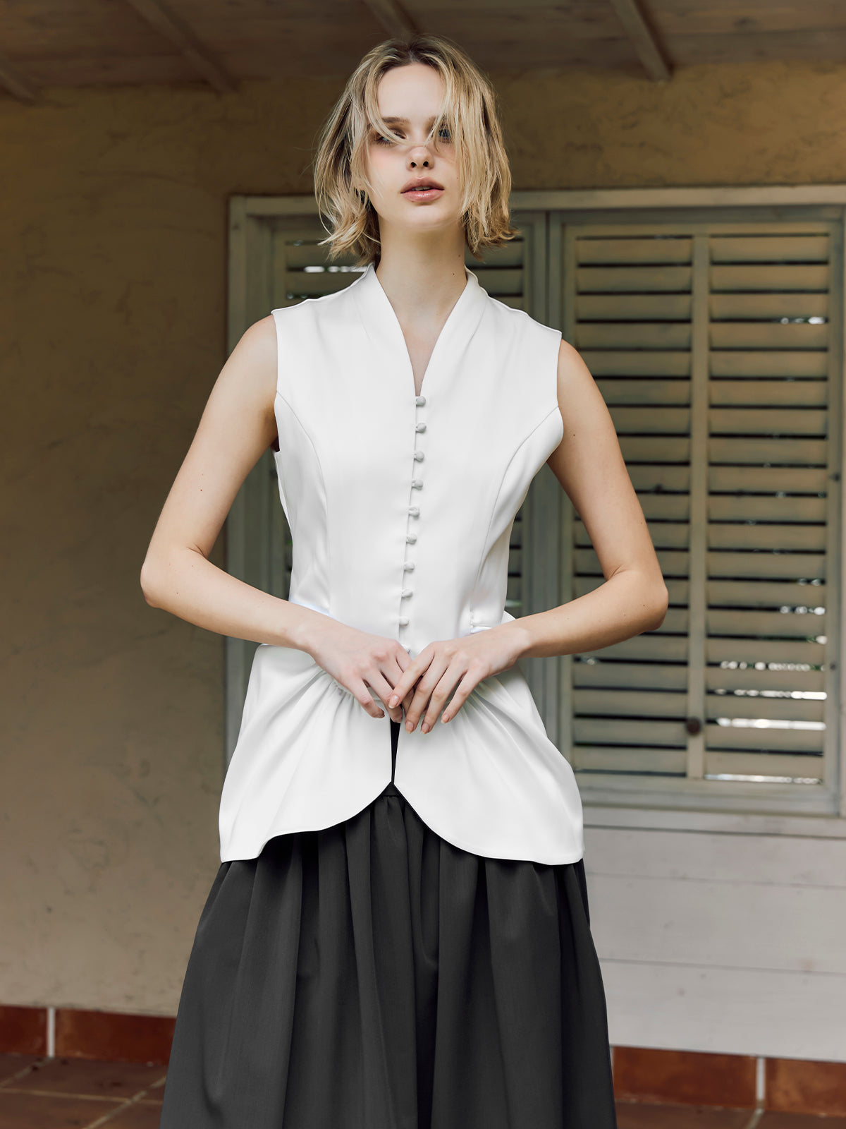 Lucy - peplum vest
